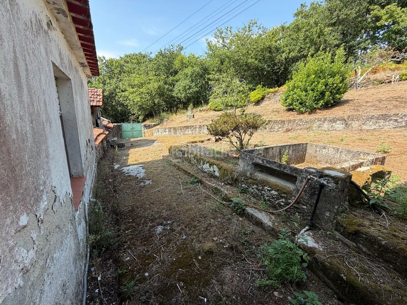 Foto db8acb7a-1864-42ce-8c07-6c8e51e82c04. Casa aparellada a Marín
