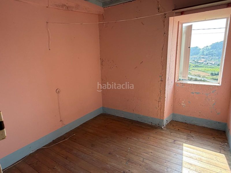 Foto e387065d-22ba-467b-8ff5-2195eeb4ce5d. Casa aparellada a Marín