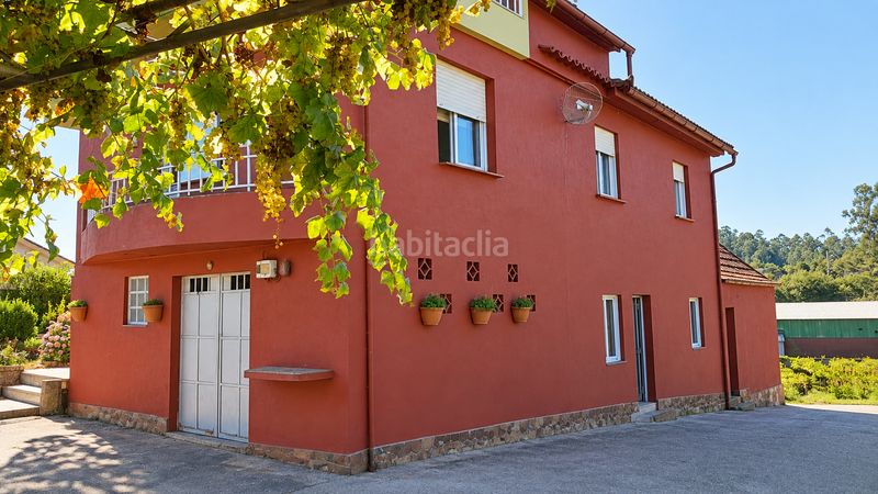 Foto 5098cf58-2d92-44b2-9e09-4ff081424a84. Chalet with fireplace heating parking in Salvaterra de Miño