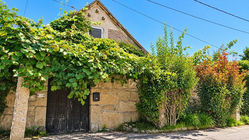 Foto a1d13526-51cf-4733-aa5c-1580f92f1b33. Chalet with fireplace heating parking in Salvaterra de Miño