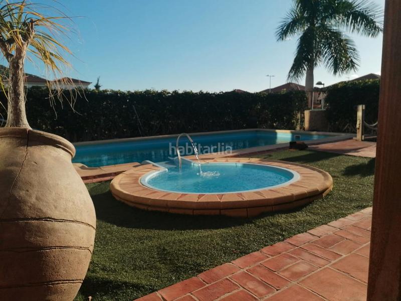 Foto 08d3fd56-f42c-4cd5-bd54-734ad2f676fc. Maison avec cheminée parking piscine dans Playa Fañabé Alto Adeje