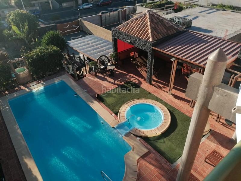 Foto 86a67611-a1d9-4a9c-baf9-7efb982b6001. Maison avec cheminée parking piscine dans Playa Fañabé Alto Adeje