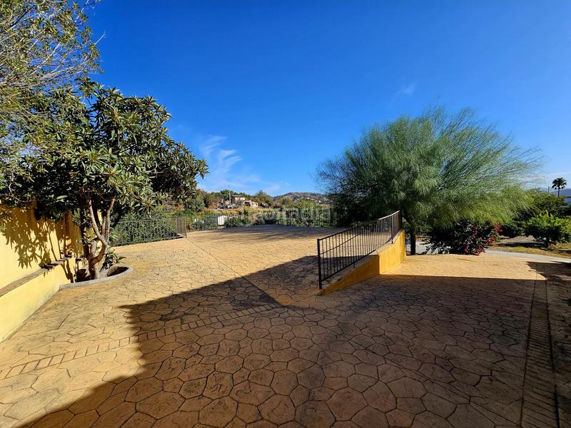 Foto 15af0ead-8c68-4d7b-9691-a168114e32be. Chalet in Coín