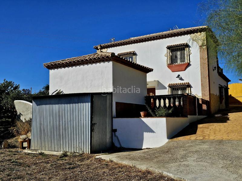 Foto 1746ae74-c20f-49fb-8778-428d6885ecfb. Chalet in Coín