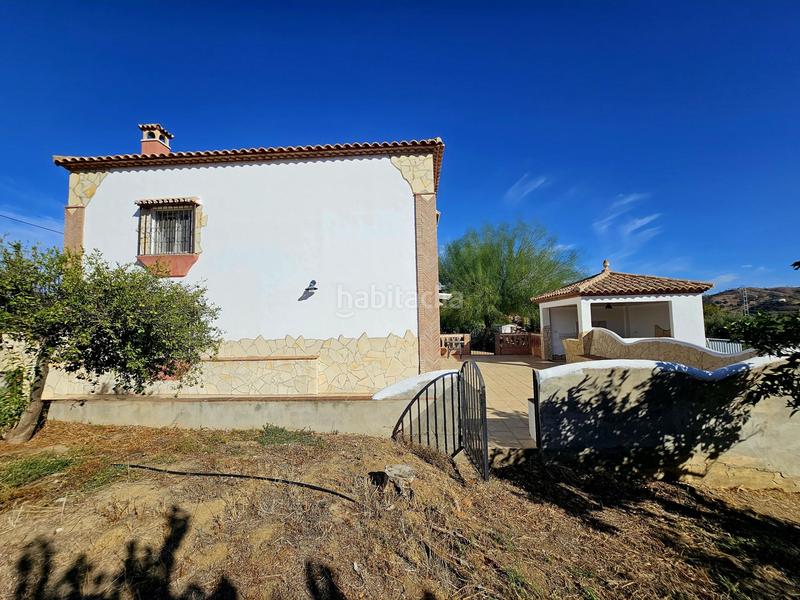 Foto 1beb9a1c-7e68-4362-a77f-020f4440ea20. Chalet in Coín