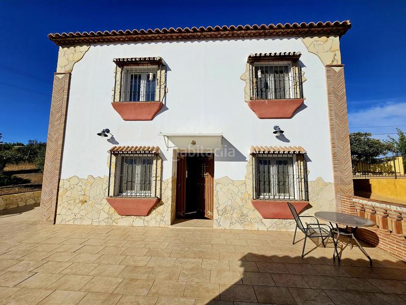 Foto c7e593cf-5cce-465c-a852-612518ca8e2a. Chalet in Coín