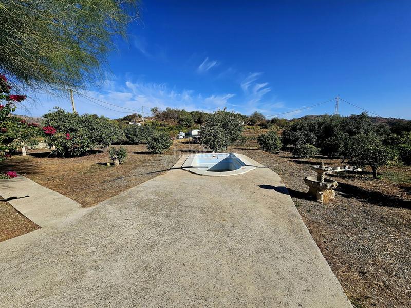 Foto fc7e3410-8a11-4de3-b69e-ed5286dc42a9. Chalet in Coín