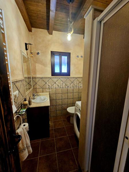 Foto 242d1931-edb8-46f4-aaf1-cedd9655e46c. Masía en Coín