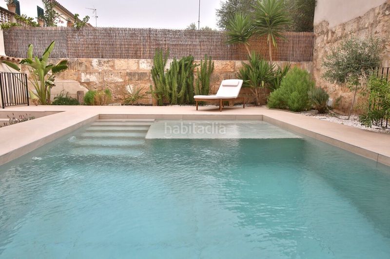 Foto 0d30c247-a25d-49ed-887b-8c4587efc4b9. Casa aparellada amb calefacció aparcament piscina a Muro