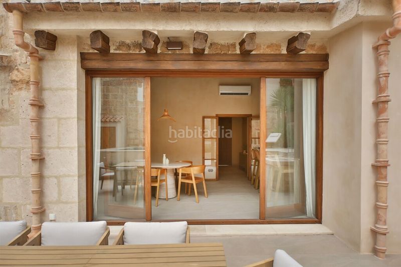 Foto 51facfdb-1094-4689-b398-771c6e6a2604. Casa aparellada amb calefacció aparcament piscina a Muro