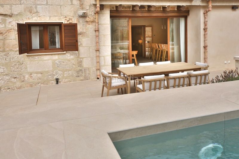 Foto 5b019529-bf4f-4a02-8186-051dc1fd9ae7. Casa aparellada amb calefacció aparcament piscina a Muro