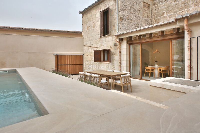Foto 8b72ad2c-e80d-4703-ba26-7d1373f1b429. Casa aparellada amb calefacció aparcament piscina a Muro