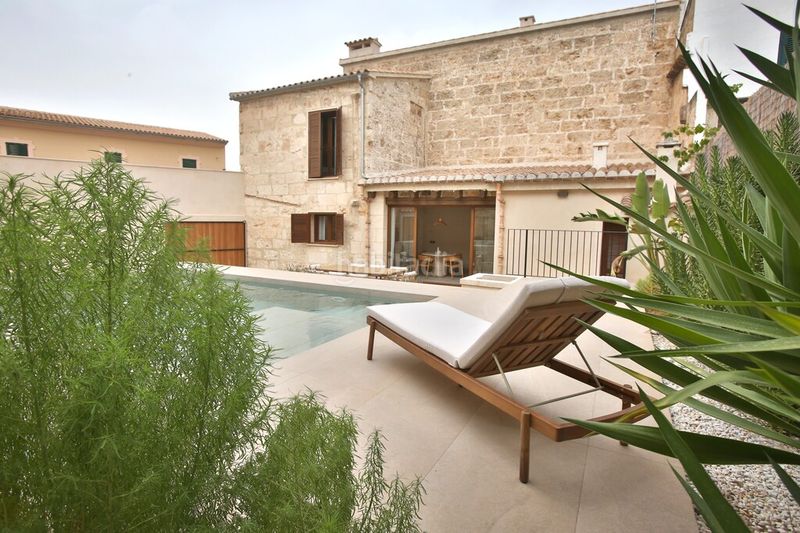 Foto b853ad29-e221-40a6-b879-16151a75bf49. Casa aparellada amb calefacció aparcament piscina a Muro