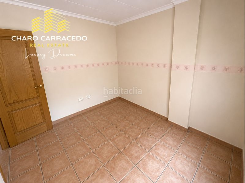 Foto c8526aab-8d28-4dde-8eb8-358e6e6ad4af. Casa adossada a Albal