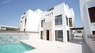 Semi detached house  N/a. Exclusiva villa de obra nueva lista para entrar a vivir con pisc
