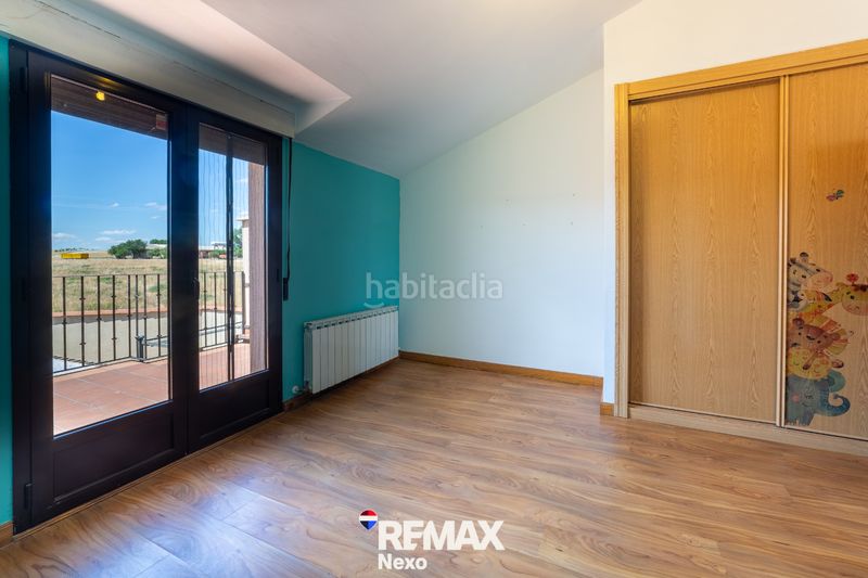 Foto f81dfd3b-f28b-4bd3-8c33-91eebdb02c60. Casa adossada amb aparcament a Roda de Eresma