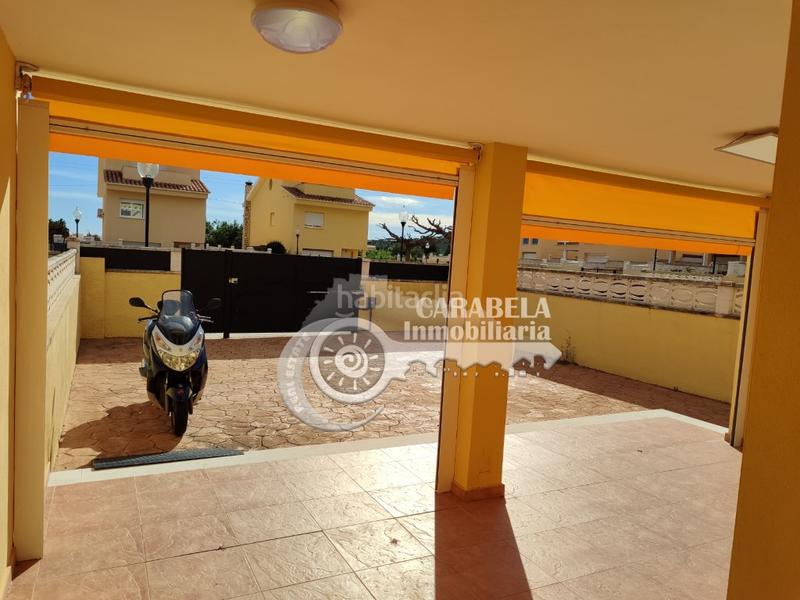 Foto 5430d9ee-6baf-4d76-bc6a-fc6161f5a1c7. Semi detached house with parking pool in Las Atalayas-Urmi-Cerro Mar Peñíscola