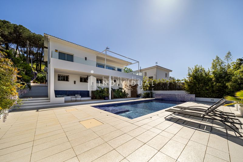 Foto 2a65c0bf-8715-494e-bd2f-fa7cb3a66bce. Casa amb xemeneia calefacció aparcament piscina a Vallromanes