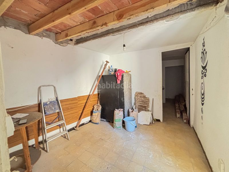 Foto 50df279d-8a2e-432e-aad9-40779bc85905. Casa aparellada a Coves de Vinromà (les)