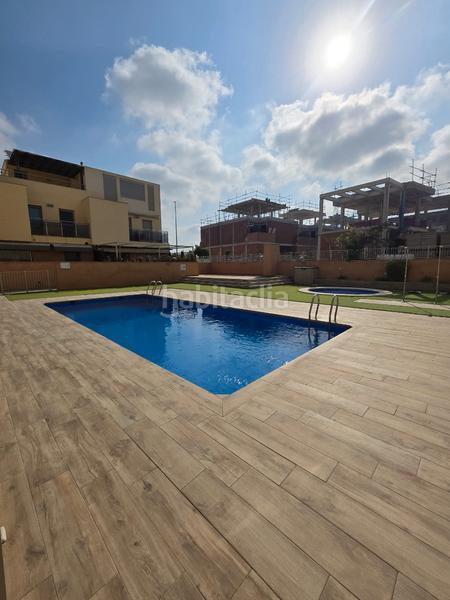 Foto 1f12993e-fe22-4052-9018-d0e71232aa76. Casa adosada adosado con piscina en San Antonio de Benagéber