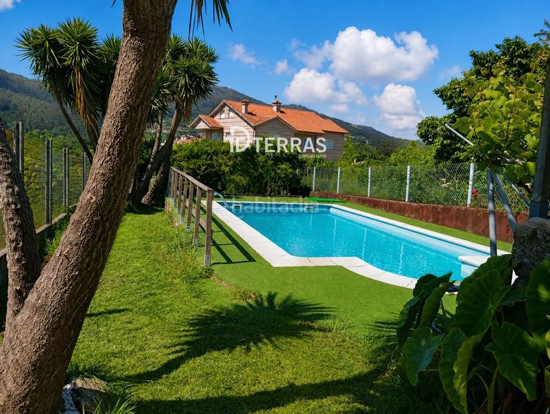 Foto 4cce416f-d74c-4b6a-9b3f-493e69b77916. Casa amb calefacció aparcament piscina a san xoán de Poio Poio