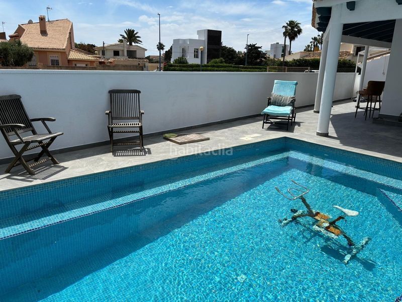 Foto cc55c4ea-33f9-4cb4-930b-e87fd19ab9f4. Xalet amb calefacció aparcament piscina a Punta Prima Torrevieja