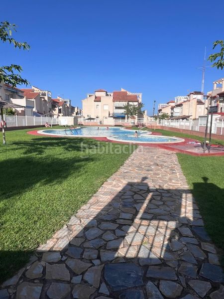 Foto 8e9a817e-1c02-4ecd-9a04-22f3ba250636. Planta baixa amb aparcament piscina a Playa Flamenca Orihuela