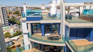 Àtic a Punta Prima. Ático de lujo en primera línea de mar  sea senses, punta prima