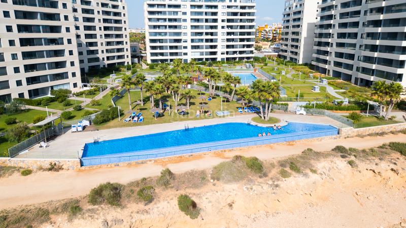 Foto 0c49e2f6-c807-42a0-a0f8-a6d84712b4e8. Apartament amb calefacció aparcament piscina a Punta Prima Torrevieja