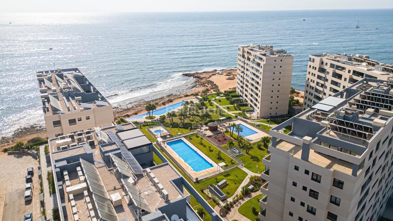 Foto 384bdaef-cb45-47a6-a6ef-ca317fb87393. Apartament amb calefacció aparcament piscina a Punta Prima Torrevieja