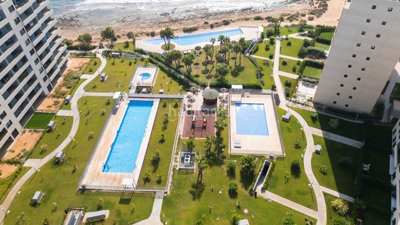 Foto 5e143204-4ab6-493a-85ae-2506ed8f5b27. Apartament amb calefacció aparcament piscina a Punta Prima Torrevieja