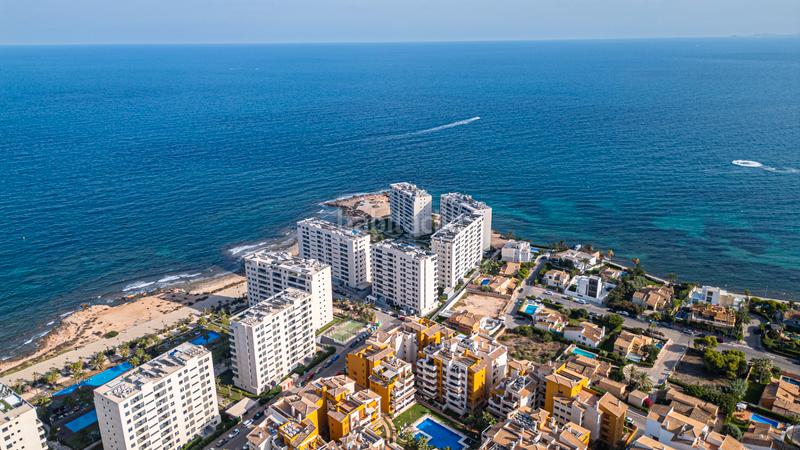 Foto c36c6581-8903-43c4-8476-a4ce71976bf5. Apartament amb calefacció aparcament piscina a Punta Prima Torrevieja