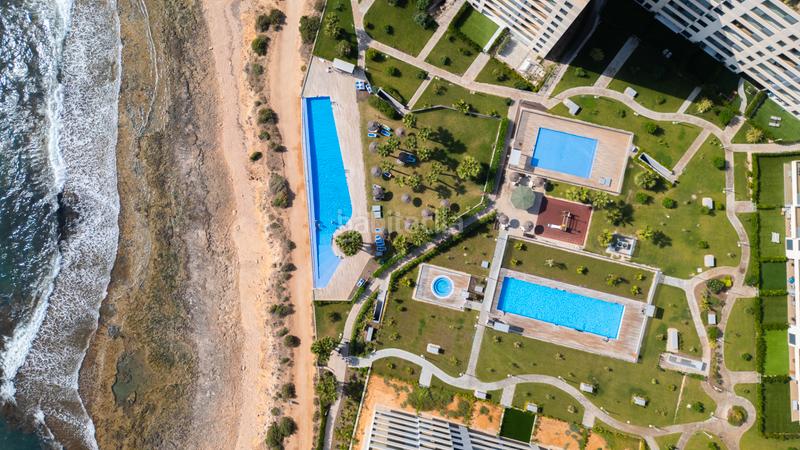 Foto e9e73923-e4f4-4d3e-9780-39da22124212. Apartament amb calefacció aparcament piscina a Punta Prima Torrevieja