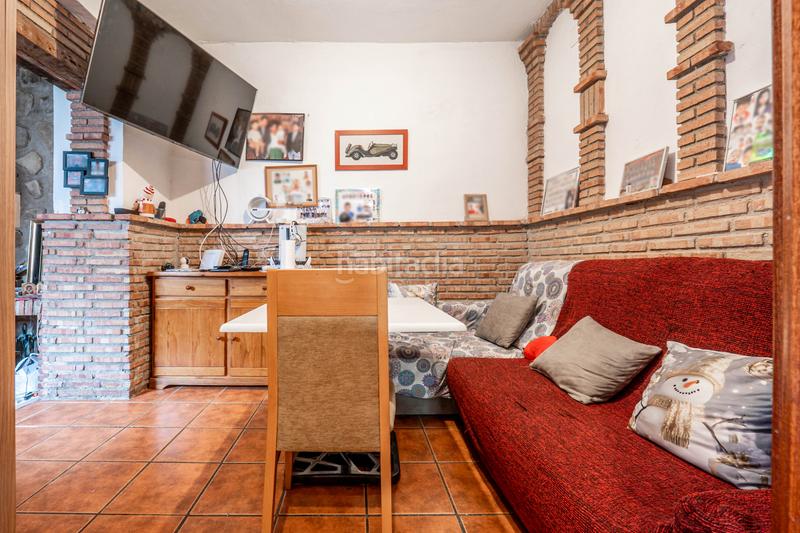 Foto d9bd2205-d01f-419e-9ca5-f3e98554a7b9. Casa a schiera con camino in Avda. De los Ogíjares Armilla