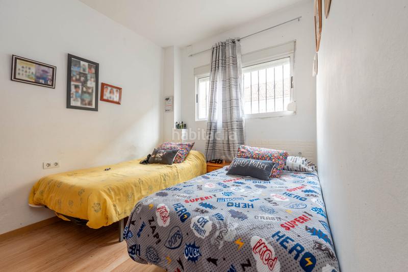 Foto 0cf7ca50-c807-4d38-93f9-9af7f461217d. Maison jumelée avec cheminée dans Avda. De los Ogíjares Armilla