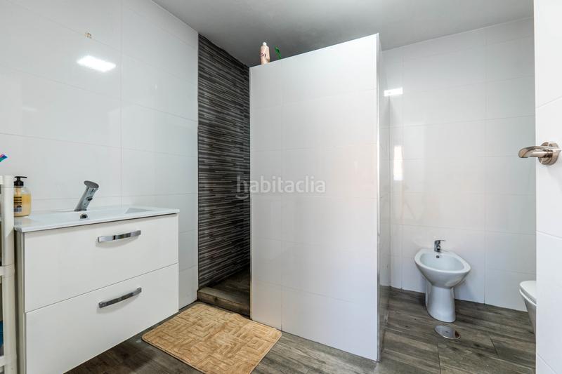 Foto 0efcab8c-6a25-42db-b740-614ec4b859bd. Maison jumelée avec cheminée dans Avda. De los Ogíjares Armilla