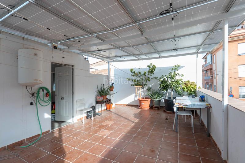 Foto 8197f7fc-2dc8-45d5-82c4-b79913f95ce1. Maison jumelée avec cheminée dans Avda. De los Ogíjares Armilla