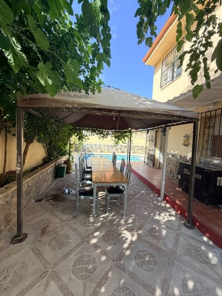 Foto 98a4cb97-3971-4afa-b525-51780d0a3c3e. Chalet mit kamin heizung pool in Ventas de Retamosa (Las)