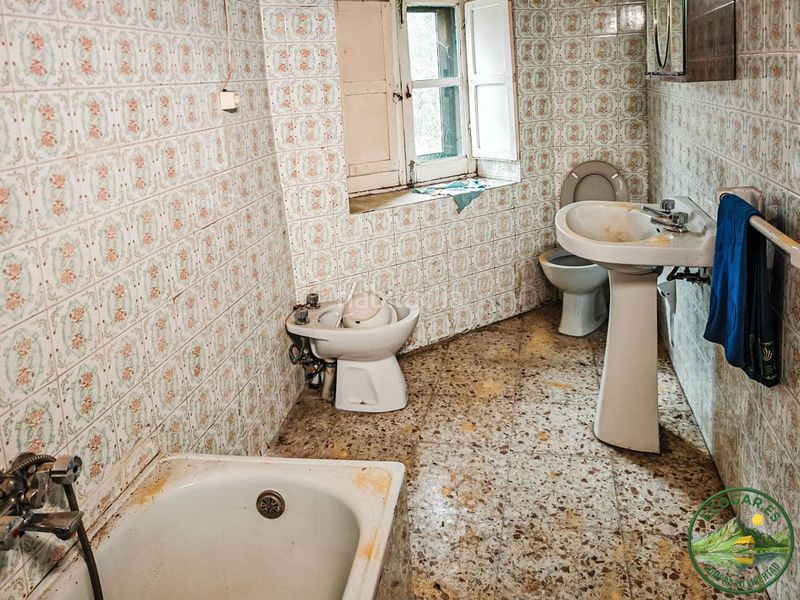 Foto c36146cf-ba5b-439a-89dd-1f23541c4cf5. Casa adossada a Trabadelo