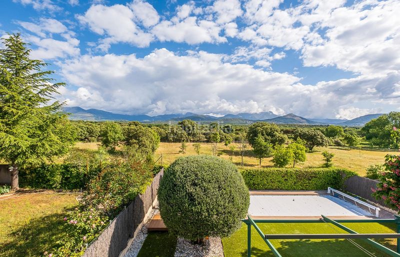 Foto 555ca208-28cf-4cbb-9f0f-20c4c60e8337. Casa aparellada amb calefacció aparcament piscina a Guadarrama