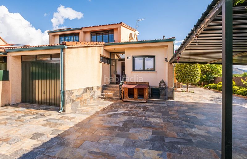 Foto 9ec7b8da-f5d4-47d1-9a70-10a2700384c5. Casa aparellada amb calefacció aparcament piscina a Guadarrama