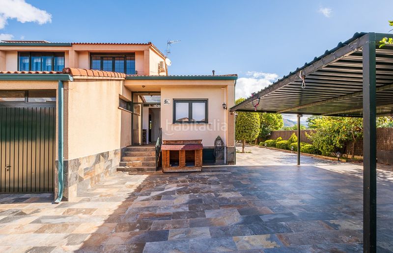 Foto dd5c8611-6990-43a6-b103-d5016a46d5d8. Casa aparellada amb calefacció aparcament piscina a Guadarrama