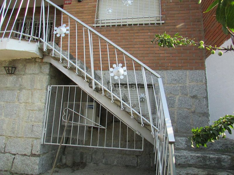 Foto 11293d02-b379-4362-9867-79128c500673. Casa adossada amb calefacció aparcament piscina a Collado Mediano