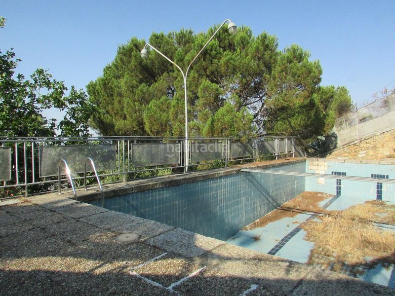 Foto 155989bc-1ad4-45ba-b576-e4ff05e7264f. Casa adossada amb calefacció aparcament piscina a Collado Mediano