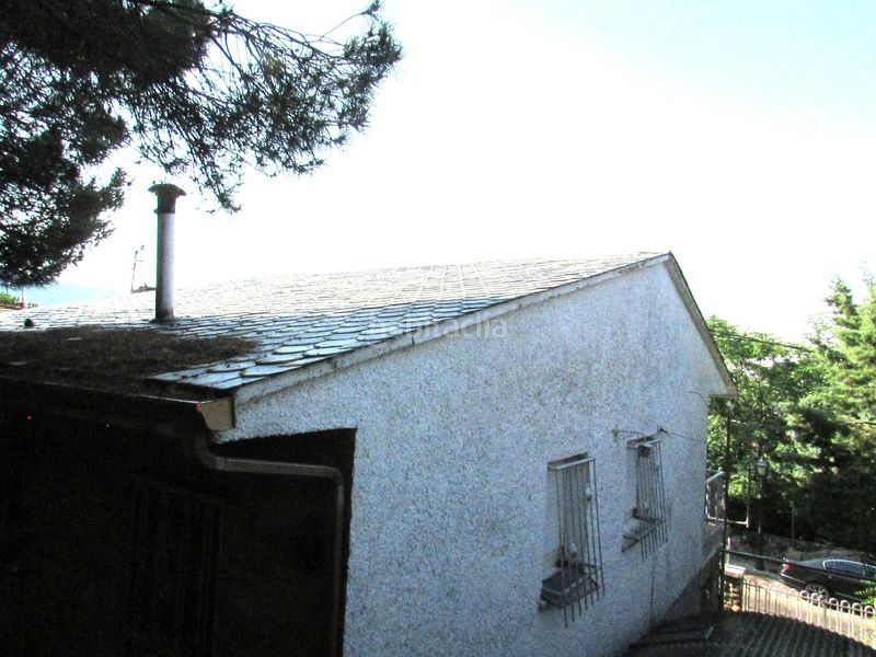 Foto 65181d00-06a5-47e2-b0df-7e4f56f20a9c. Casa adossada amb calefacció aparcament piscina a Collado Mediano