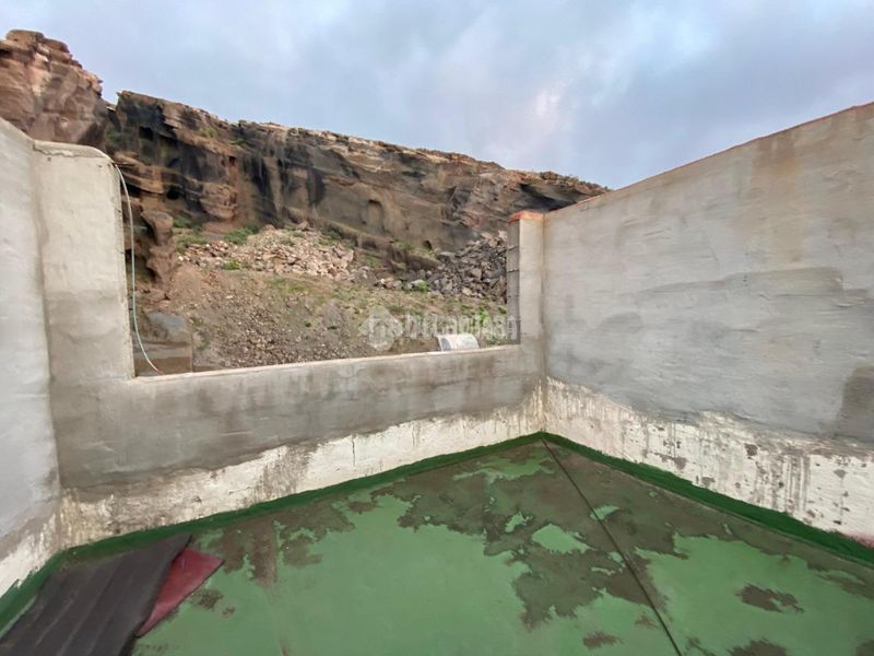 Foto ea46b863-5e5a-4573-b8b5-5fbe3cda65ff. Casa amb aparcament a Gáldar pueblo Gáldar