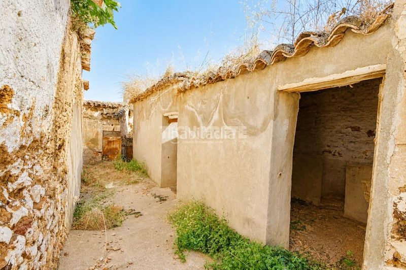 Foto d1509b0f-f2d5-4201-8e0b-522edf959526. Casa aparellada amb aparcament a Yébenes (Los)