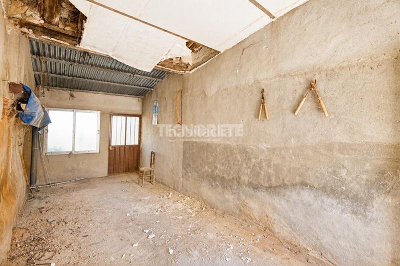 Foto ff49f961-d999-4a6b-be93-6cac498df546. Casa aparellada amb aparcament a Yébenes (Los)