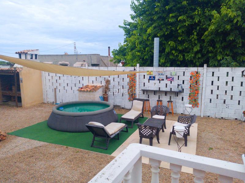 Foto f4fb5c1f-e55f-48cb-b7fc-3700f134f1ef. Xalet amb xemeneia aparcament a El Marenyet Cullera