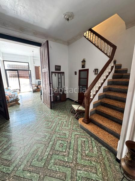 Foto e5024318-013c-40e5-87da-a77a2f237d6b. Reihenhaus mit kamin in Favara